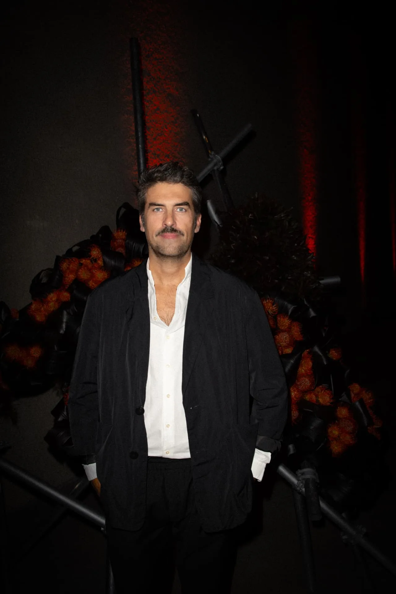 A founder of EX NIHILO in black tailoring at the Demon Dancer launch in berlin